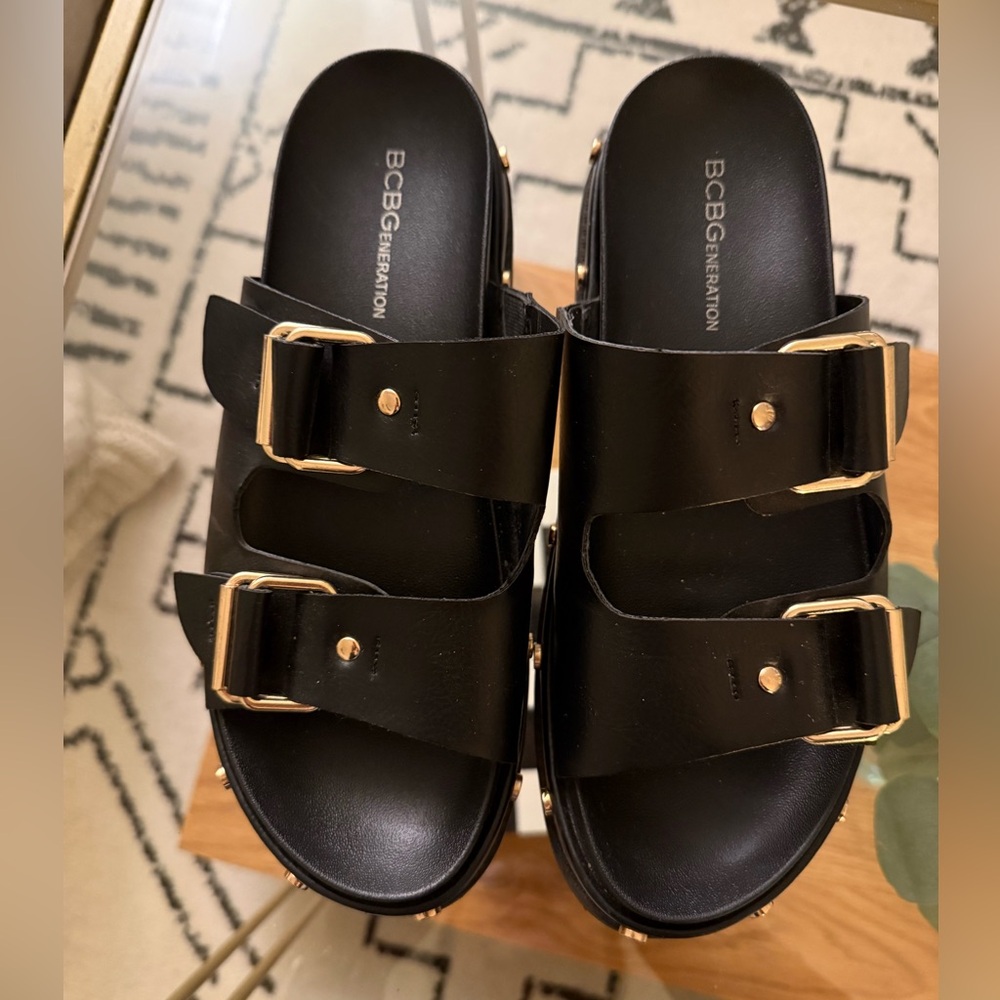 BCBGeneration Black Slides with Gold Buckles 8.5